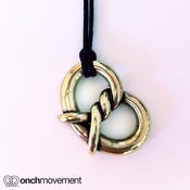 Image of Onch Movement Gold Man Pretzel