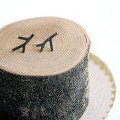 Image of black branch studs
