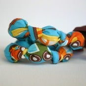 Image of ORGANIC Teal Trains Chomping Necklace