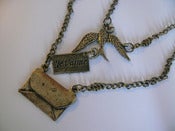 Image of Je t'aime Swallow Pendant