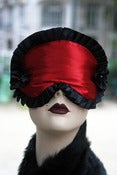 Image of "Vixen" sleep mask in red satin and black pleated ribbon