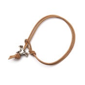 Image of silver single vertebrae on natural leather bracelet (B01sil)