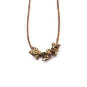 Image of 14k gold triple vertebrae on wax-coated cotton w/ 14k gold caudal vertebrae closure (P023B1014k)