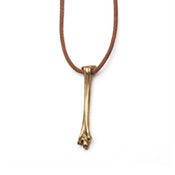 Image of 14k gold femur bone w/ diamond on wax-coated cotton w/ 14k caudal vertebrae closure (P01B1014k)