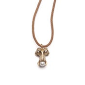 Image of 14k gold caudal vertebrae w/ pearl on wax-coated cotton w/ 14k caudal vertebrae closure (P03B1014k18