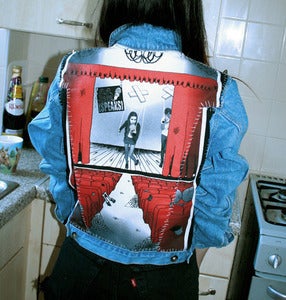 Image of Stitched Up! Ladies Light - Mid Blue 'SPEAKS' Denim Jacket (Medium)