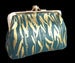 Image of gold leaf feuschia purse