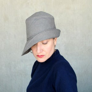 Image of Harbinger in grey rainwear