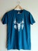 Image of Men's Tee with Skull Design - Tri-Evergreen
