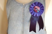 Image of ribbon badge