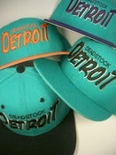 Image of VINTAGE NEW ERA DETROIT DEADSTOCK SNAPBACK (MANY COLORS)