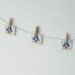 Image of Tiny Clothespins in a Jar