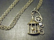 Image of Bird cage necklace.