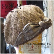 Image of beanie hat with pokla dots bow