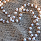 Image of Pearl Necklace On Leather