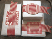 Image of Large Red Letterpress Buckles with ribbon