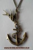 Image of Swooping Swallow Bird and Anchor Antique Gold Coloured necklace