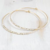 Image of duality gold and silver hoop s/m/l