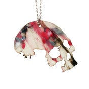 Image of Ltd. Edition Skull made from a recycled CLEAR/RED/BLACK/WHITE SPLATTER vinyl record.