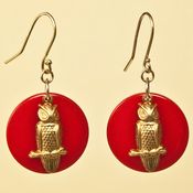 Image of Vintage Owl Charm Earrings on Red Celluloid Disc