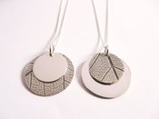 Image of leaf print necklaces
