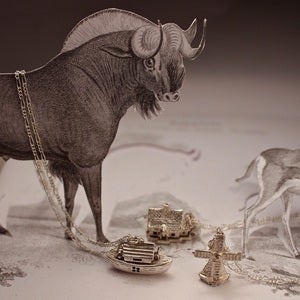 Image of vintage silver charm necklaces