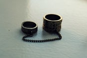Image of double finger chain ring.