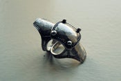 Image of armour knuckle ring.