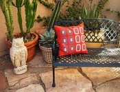 Image of Desert Blossoms on red: organic cotton pillows screenprinted by hand