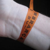 Image of orange (laranja) brazilian wish band