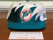 Image of VINTAGE DEADSTOCK MIAMI DOLPHINS "WAVE/SHARKTOOTH" LOGO ATHLETIC SNAPBACK CAP HAT