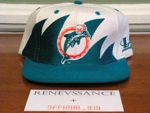 Image of VINTAGE DEADSTOCK MIAMI DOLPHINS "WAVE/SHARKTOOTH" LOGO ATHLETIC SNAPBACK CAP HAT