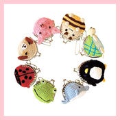 Image of Borsellino porta monete ad uncinetto per bambini