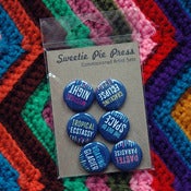 Image of fireworks commissioned artist button set by ray fenwick.