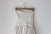 Image of 1950s ivory strapless dress