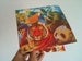 Image of 'Hasta la Fiesta' double 7" by Papier Tigre, Pneu, Electric Electric, Marvin
