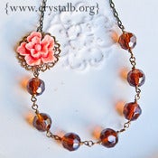 Image of Madame Ryan in Coral and Brown