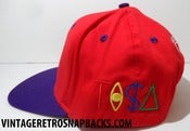 Image of VINTAGE TORONTO RAPTORS TI$A SNAPBACK TISA RED 