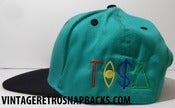 Image of VINTAGE VANCOUVER GRIZZLES TI$A SNAPBACK TISA TEAL
