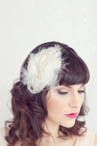 Image of feather headband with rhinestone design