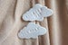 Image of broches "Emmenez moi" / "Far away"