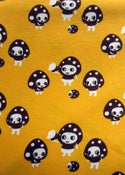 Image of Yellow mushrooms cotton interlock (by half metre)