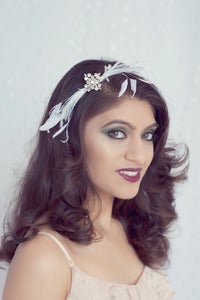 Image of Vintage rhinestone brooch and feather headband