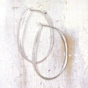 Image of silver oval hoop