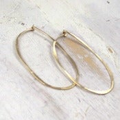Image of gold oval hoop
