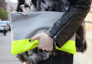 Image of neon stripe clutch