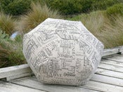 Image of 'Muse' design floor cushion - black on stone