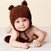 Image of "Sam" Brown Bear hat with earflaps and pompoms