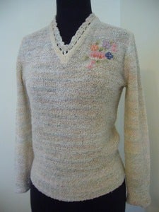 Image of embroidered bouclé knit sweater