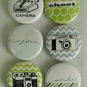 Image of shoot smile snap badge buttons